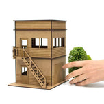 Wooden press tower for a slot car track